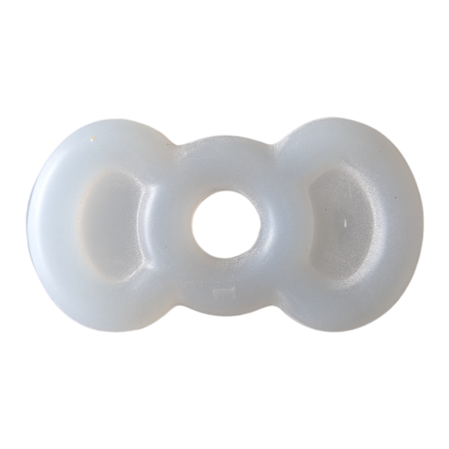 Ein kleiner Erektionsring aus Silikon zur Anwendung mit einer Vakuum-Erektionshilfe.